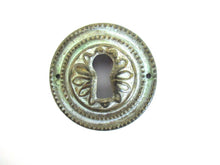 1 (ONE) Brass Keyhole cover, escutcheon, keyhole frame.