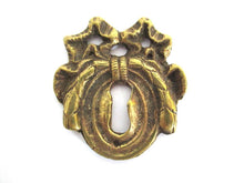 Antique Bow Escutcheon, Solid Brass, Keyhole Cover.
