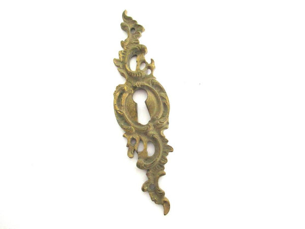 1 (ONE) Antique ornate brass keyhole cover. Ornamental escutcheon, cabinet hardware, furniture applique.