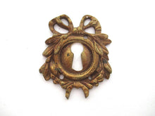 1 (ONE) Escutcheon, Laurel, bow, embellishment, Empire Solid brass, keyhole cover, Restoration hardware.