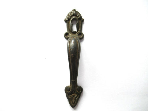 Cabinet Pull including keyhole cover, escutcheon.