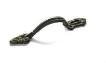 Cabinet Pull including keyhole cover, escutcheon.