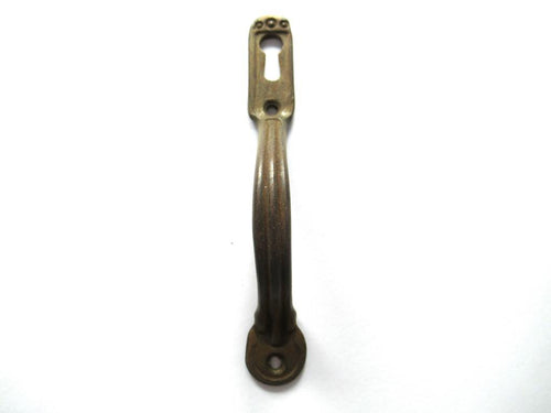 Authentic vintage cabinet handle including keyhole cover, escutcheon.