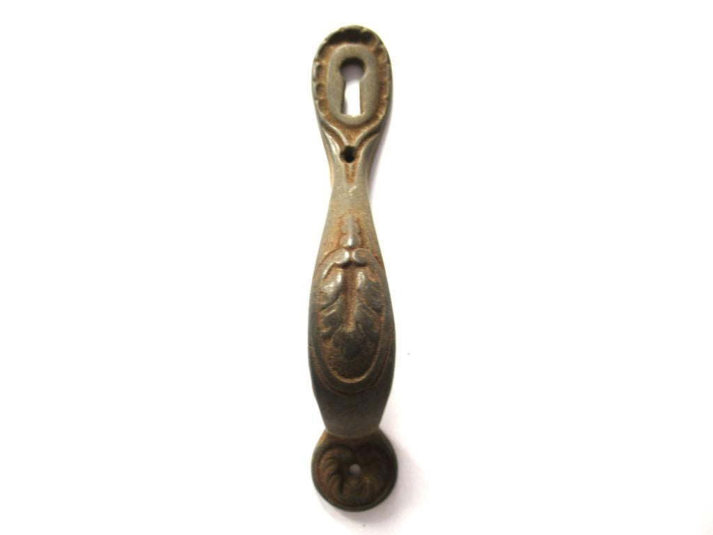 Authentic Handle including keyhole cover, escutcheon.