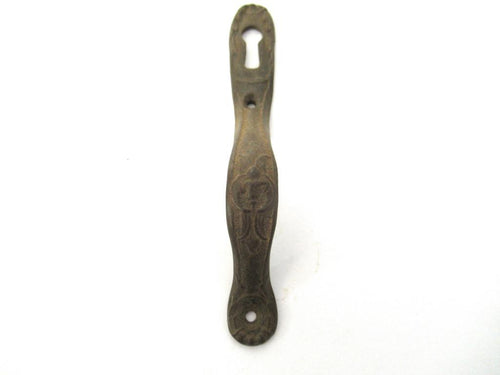 Vintage cabinet handle including keyhole cover, escutcheon.