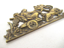 Antique embellishment, ornament, pediment. Empire, lions, chariot.