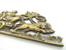 Antique embellishment, ornament, pediment. Empire, lions, chariot.