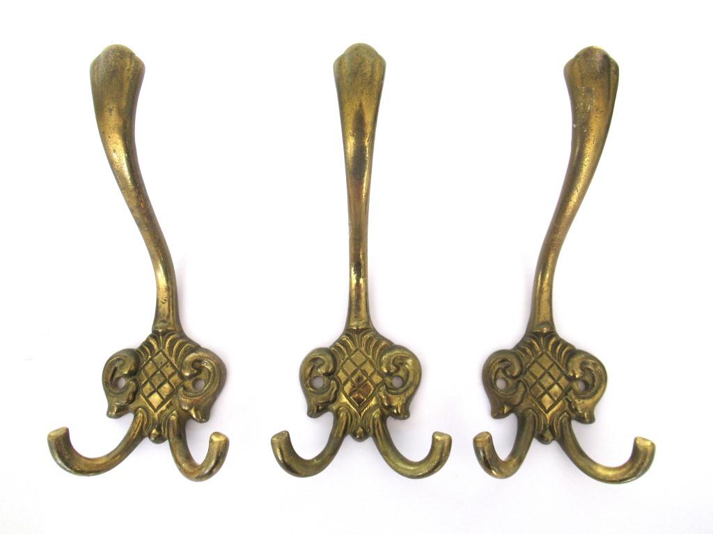 At Auction: Pair Vintage Brass Bow Wall Hooks