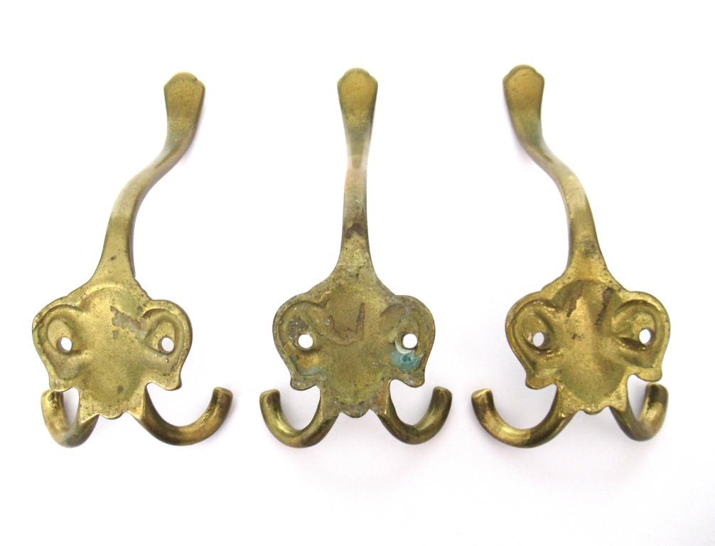 Set of 3 Solid Brass Ornate Victorian style wall hooks. Vintage