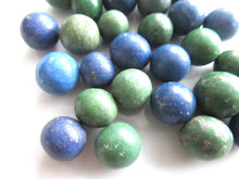 Set of 30 Green / Blue Antique Clay Marbles.