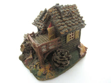 Gnome house and mouse' after a design by Rien Poortvliet, Gnome figurine.