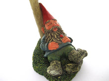 Gnome sleeping under a mushroom. 'Slumber Chief' a design by Rien Poortvliet.