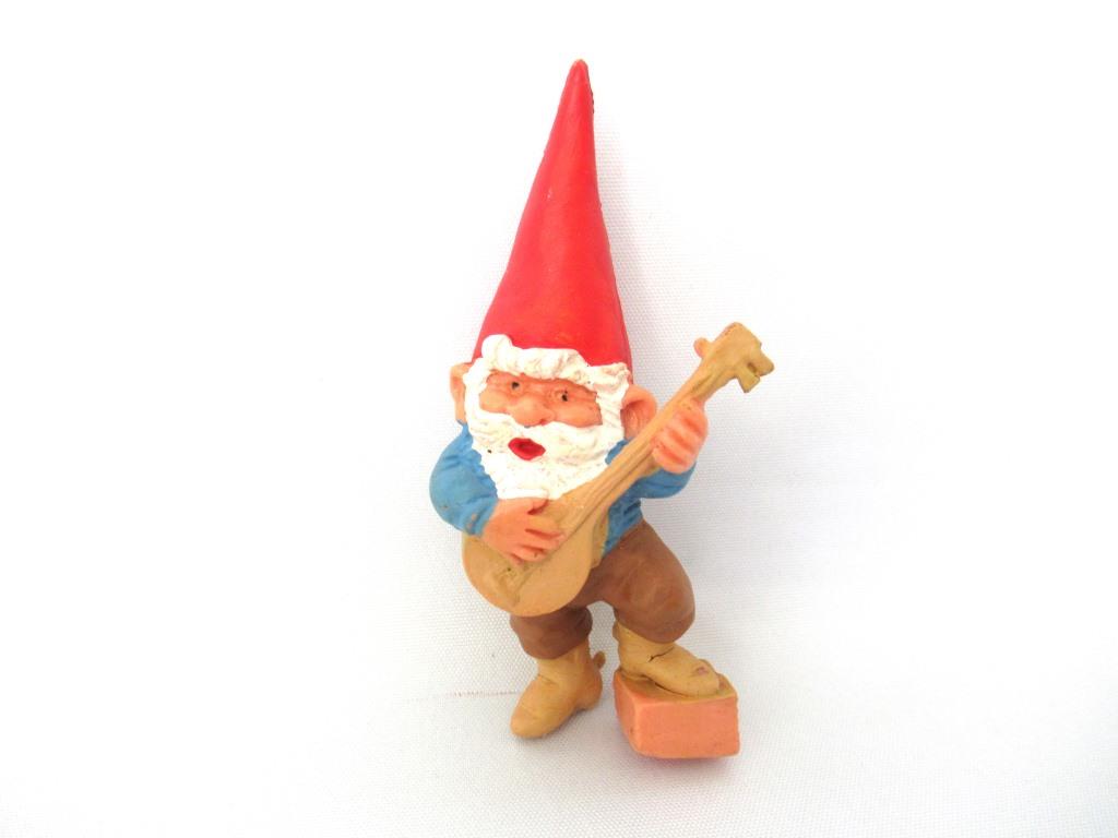 Banjo playing gnome. After a design by Rien Poortvliet, Brb collectible pocket, miniature garden gnome.