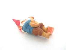 Banjo playing gnome. After a design by Rien Poortvliet, Brb collectible pocket, miniature garden gnome.