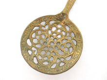 Vintage Brass skimmer.