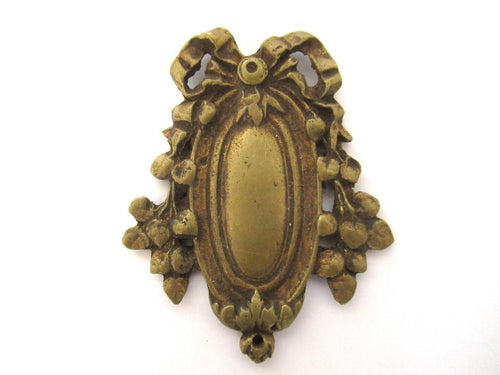 Antique Escutcheon, bow, embellishment, Restoration hardware.