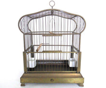 UpperDutch:,Antique German Bird Cage with porcelain feeders and glass panels on both sides.