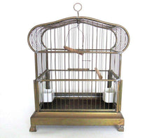 UpperDutch:,Antique German Bird Cage with porcelain feeders and glass panels on both sides.