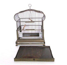 UpperDutch:,Antique German Bird Cage with porcelain feeders and glass panels on both sides.