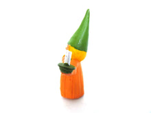 UpperDutch:,1 (ONE) Gnome figurine, Gnome after a design by Rien Poortvliet, Brb Gnome holding candle, Lisa the Gnome. Orange Pajamas