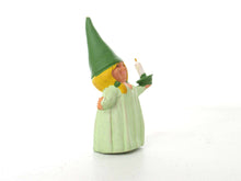 UpperDutch:,1 (ONE) Gnome figurine, Gnome after a design by Rien Poortvliet, Holding a candle, Lisa the Gnome. Green night gown, Pajamas. BRB