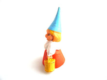 UpperDutch:,1 (ONE) Gnome figurine in orange dress, Gnome after a design by Rien Poortvliet, Brb Gnome, Lisa the Gnome carrying a bucket.