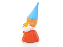 UpperDutch:,1 (ONE) Gnome with flowers figurine in orange dress, Gnome after a design by Rien Poortvliet, Brb Gnome.