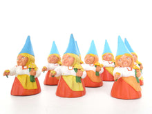 UpperDutch:,1 (ONE) Gnome with flowers figurine in orange dress, Gnome after a design by Rien Poortvliet, Brb Gnome.