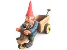 UpperDutch:,3086: 'Thomas' Gnome riding a cargo bike with shovel. Gnome figurine after a design by Rien Poortvliet. Classic Gnomes series. AAAAAAA International Co. Ltd.