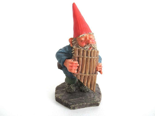 UpperDutch:Gnome,'Andreas' Gnome playing pan flute figurine after a design by Rien Poortvliet. Part of the Classic Gnomes series designed by Rien Poortvliet