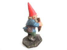 UpperDutch:Gnome,'Andreas' Gnome playing pan flute figurine after a design by Rien Poortvliet. Part of the Classic Gnomes series designed by Rien Poortvliet