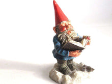 UpperDutch:,'Arthur' Reading, singing Gnome figurine. Classic gnomes series by AAAAAAA International Co. Ltd. Designed by Rien Poortvliet.