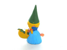 UpperDutch:,Blue dress Gnome figurine with foraging Basket, Gnome after a design by Rien Poortvliet, Brb Gnome, Lisa the Gnome.
