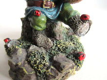 UpperDutch:,Classic gnomes 'Lucky' after a design by Rien Poortvliet Gnome with ladybugs.