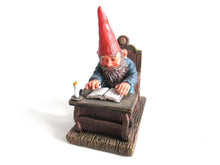 UpperDutch:,Classic Gnomes 'Rien' Gnome figurine after a design by Rien Poortvliet, Gnome reading by candlelight.