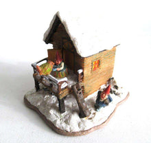 UpperDutch:,Classic Gnomes Villages 'House with Wren' after a design by Rien Poortvliet, feeding bird.