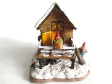 UpperDutch:,Classic Gnomes Villages 'House with Wren' after a design by Rien Poortvliet, feeding bird.