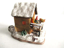 UpperDutch:,Classic Gnomes Villages 'House with Wren' after a design by Rien Poortvliet, feeding bird.