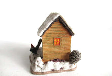UpperDutch:,Classic Gnomes Villages 'House with Wren' after a design by Rien Poortvliet, feeding bird.