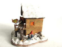UpperDutch:,Classic Gnomes Villages 'House with Wren' after a design by Rien Poortvliet, feeding bird.