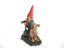 UpperDutch:,Designed by Rien Poortvliet. 'Al with Mouse' Gnome with shovel and mouse figurine. Part of the 2001 Classic Gnomes series.