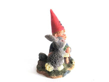 UpperDutch:,Gnome child with rabbit figurine.