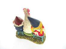 UpperDutch:Gnome,Gnome couple singing lullabies to babies after a design by Rien Poortvliet.