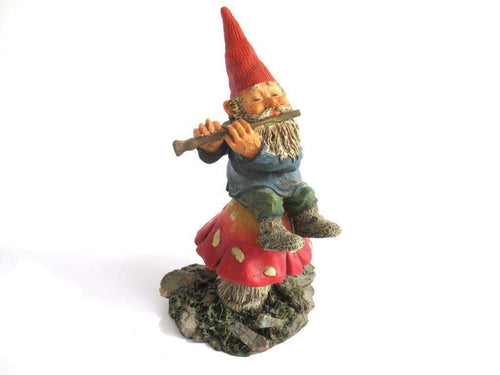 UpperDutch:Gnome,Gnome figurine 'Mo on Mushroom' after a design by Rien Poortvliet, Gnome on mushroom playing a flute. Classic Gnomes.