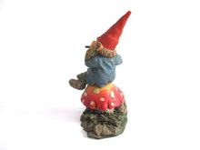 UpperDutch:Gnome,Gnome figurine 'Mo on Mushroom' after a design by Rien Poortvliet, Gnome on mushroom playing a flute. Classic Gnomes.
