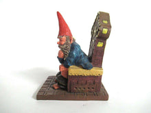 UpperDutch:,Gnome figurine 'Theodor' after a design by Rien Poortvliet. Gnome on the toilet. Dutch Classic Gnomes series. AAAAAAA International Co. Ltd.