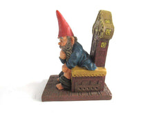 UpperDutch:Gnome,Gnome figurine 'Theodor' after a design by Rien Poortvliet. Gnome on the toilet. Dutch Classic Gnomes series. AAAAAAA International Co. Ltd.