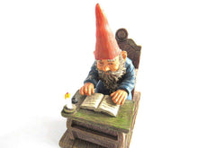 UpperDutch:Gnome,Gnome reading by candlelight, Classic Gnomes 'Rien' Gnome figurine after a design by Rien Poortvliet.