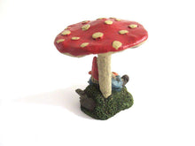 UpperDutch:Gnome,Gnome sleeping under a mushroom 'Slumber Chief' a design by Rien Poortvliet. Dutch Classic gnomes series. AAAAAAA International Co. Ltd.