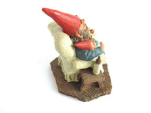 UpperDutch:Gnome,Gnome with grandchildren sitting in a chair figurine. 'Grandfather with Children' Part of the Classic Gnomes series designed by Rien Poortvliet